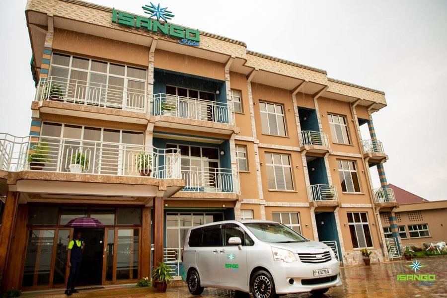 a white van parked outside Isango hotel in Gitega, Burundi