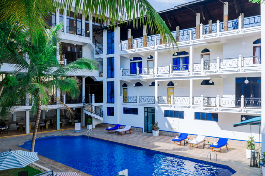 a swimming pool at the Mount Zion Hotel in Bujumbura, Burundi